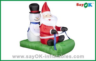 Giáng sinh ở Santa hoặc Snowman Inflatable trang trí ngày lễ với xe trượt tuyết