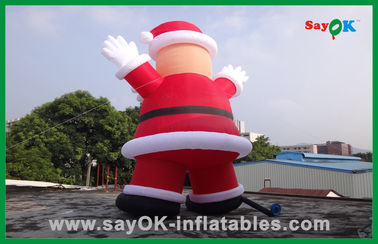 Tùy chỉnh Red Inflatable Giáng sinh Santa Claus Với Bánh mì Inflatable Cartoon Character